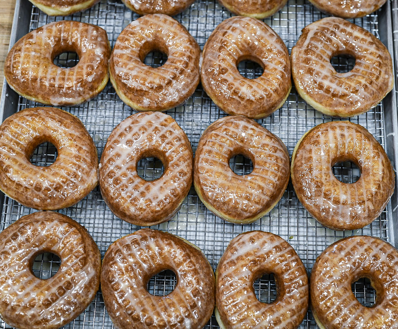 Freshly glazed crullers at La Rue Doughnuts in Dallas